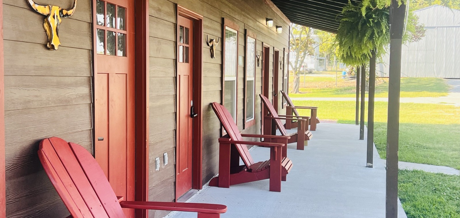 Lakeside cabin exterior at Club Lakeland Resort in warm evening light